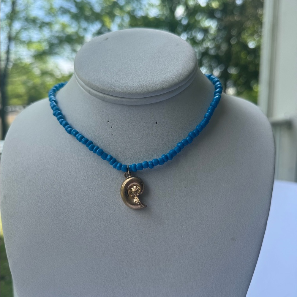 Blue Beaded Necklace with Gold Crescent Pendant